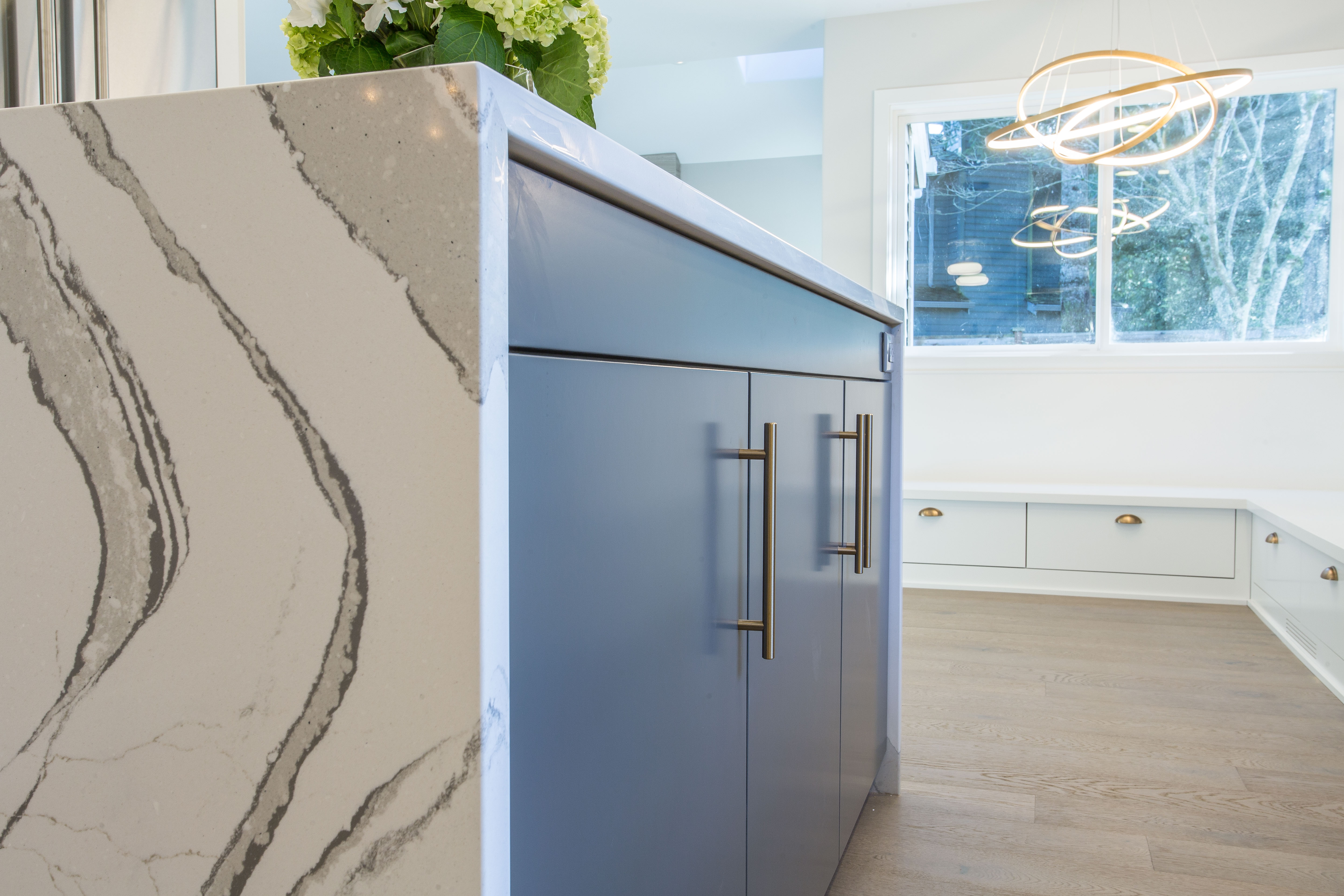 Marble waterfall island detail, Modern Moment kitchen
