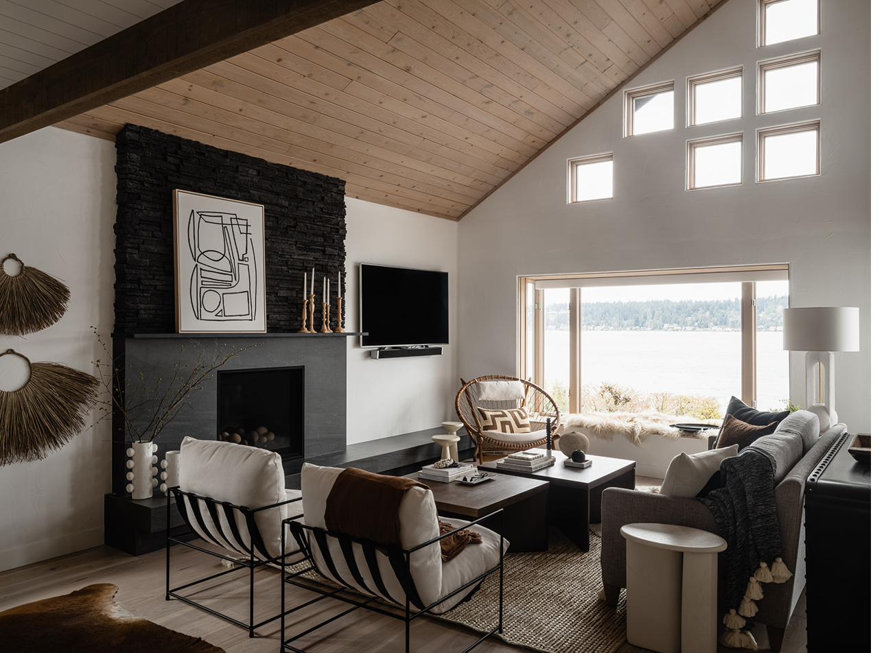 Whitestone residence: waterfront living room with vaulted cedar ceiling and stone fireplace