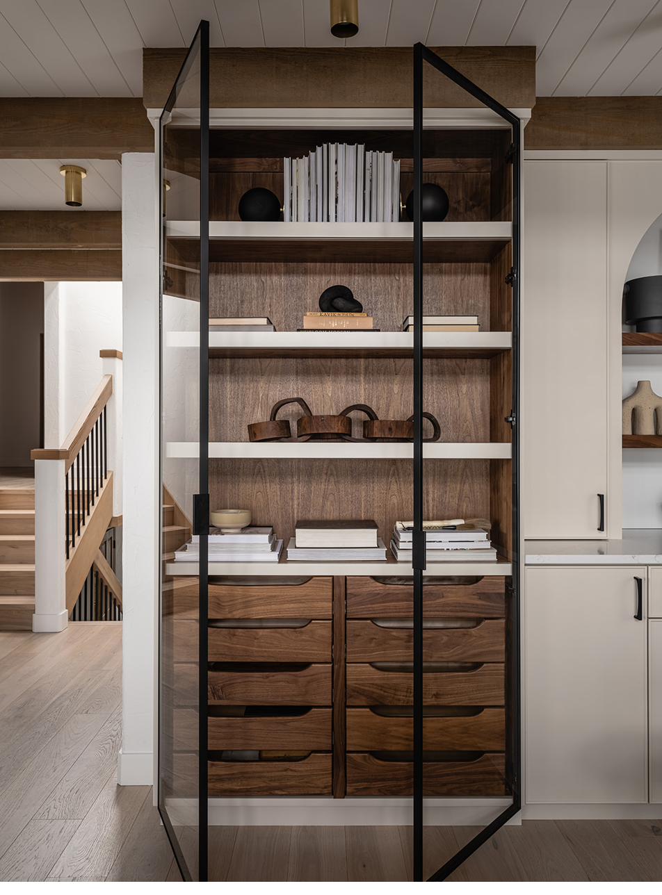 Walnut butler's pantry with glass doors